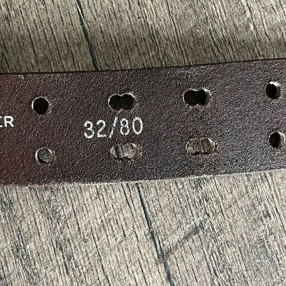 Brown Leather Belt with silver Buckle. 37 inches.